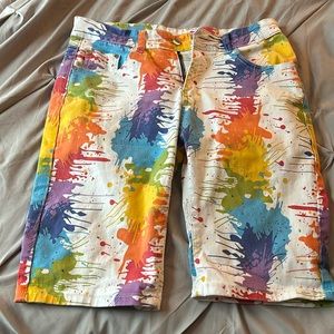 Paint splash Pride denim shorts.